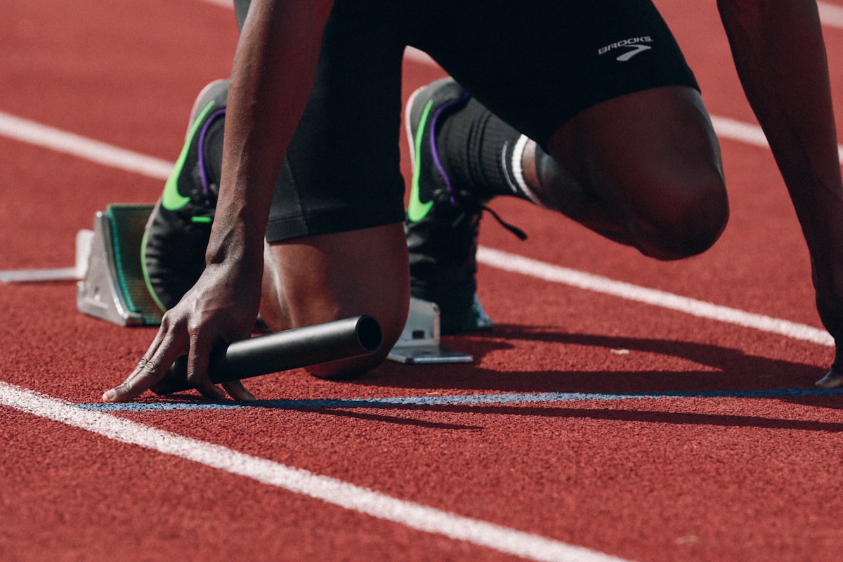 Athlete sprinting in a stadium
